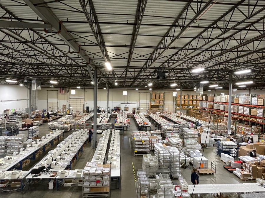 Rows of Uniprod handwriting machines running in the Louisville, Kentucky facility