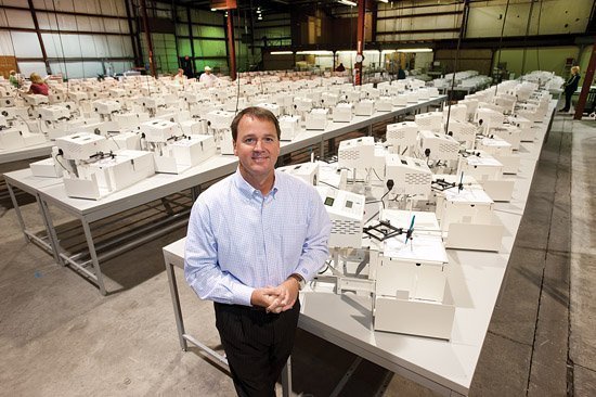 Pen Point Technologies warehouse floor with rows of handwriting machines