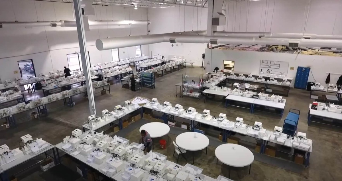 Pen Point production floor with handwriting machines writing mail